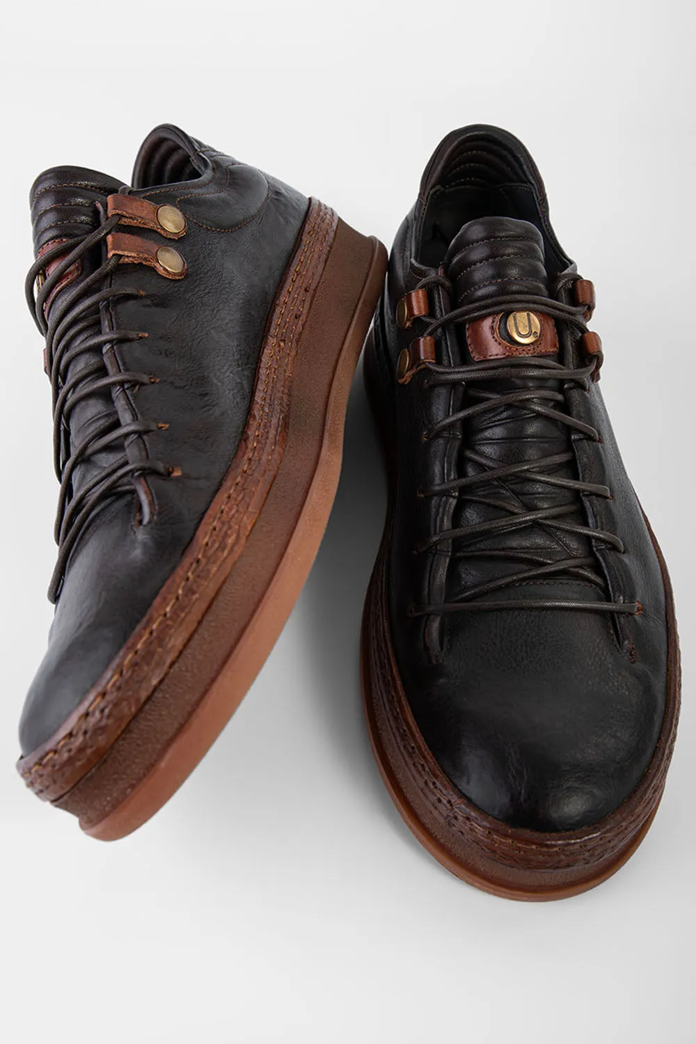 COLE dark-cocoa welted distressed sneakers.