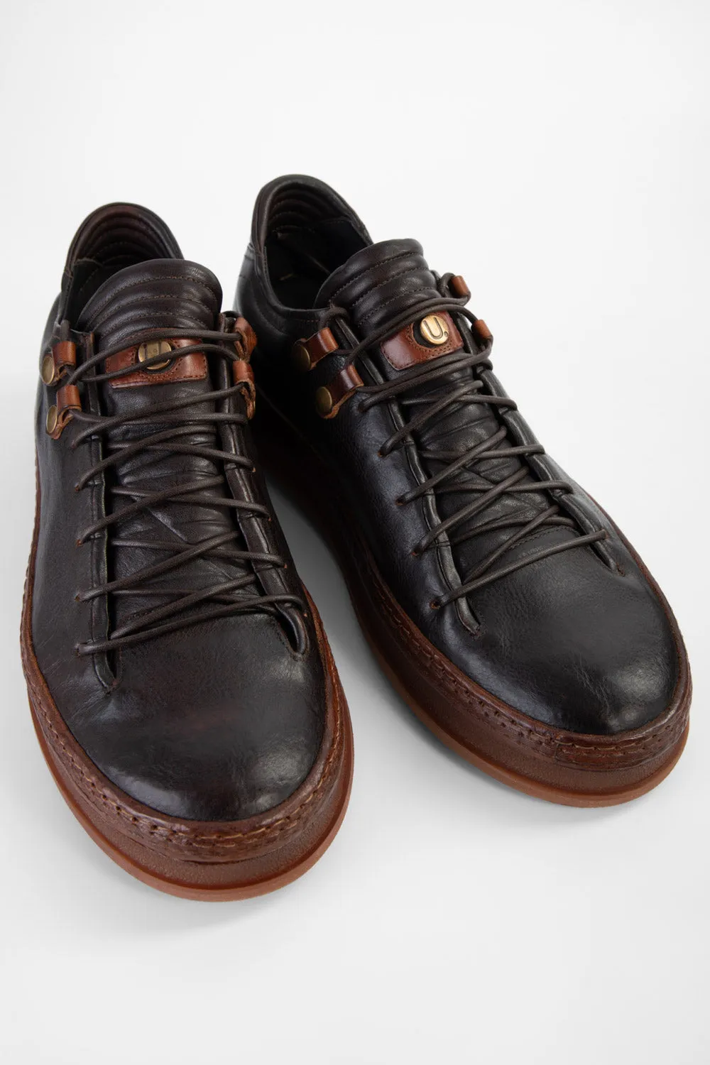 COLE dark-cocoa welted distressed sneakers.